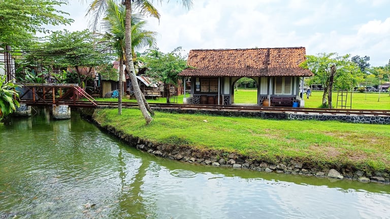 Sleman Regency, Yogyakarta, Indonesia - November 2022 : Classic Ancient home with gardens and greenery beside the river in Gamplong Studio Alam