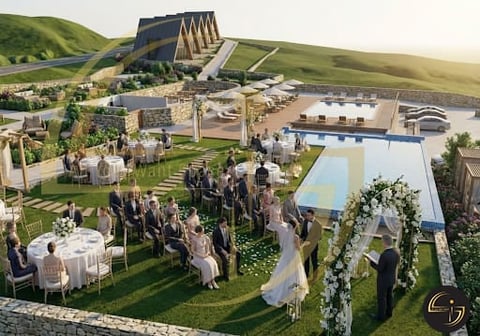 Outdoor wedding ceremony venue with manicured lawn