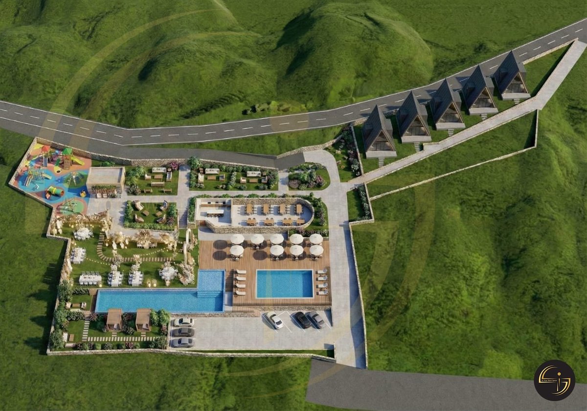Resort aerial view with gardens and pools